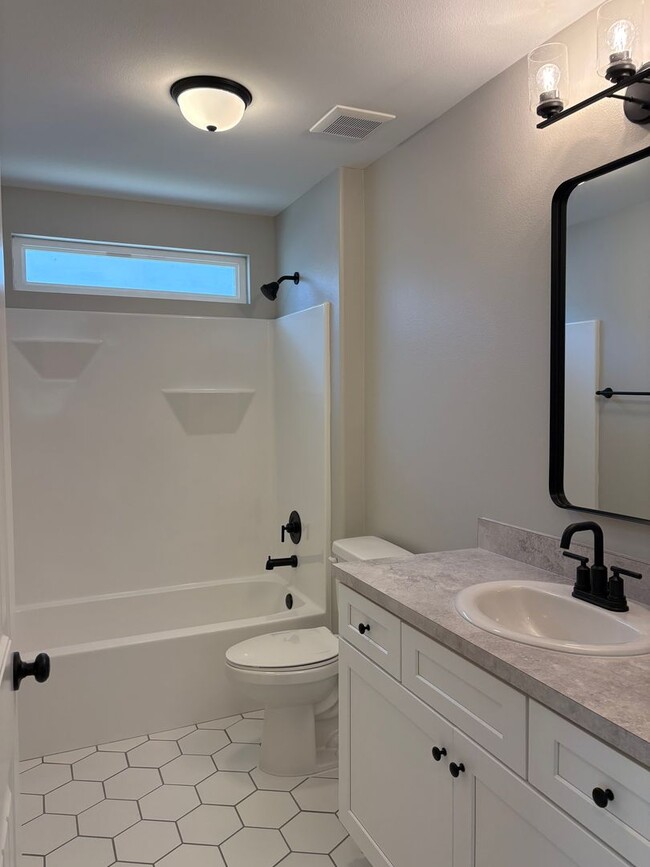 Building Photo - New 4 Bedroom Home Available Now