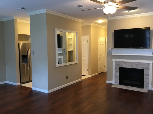 View from living room of kitchen entry and fireplace - 1103 Dulles Ave