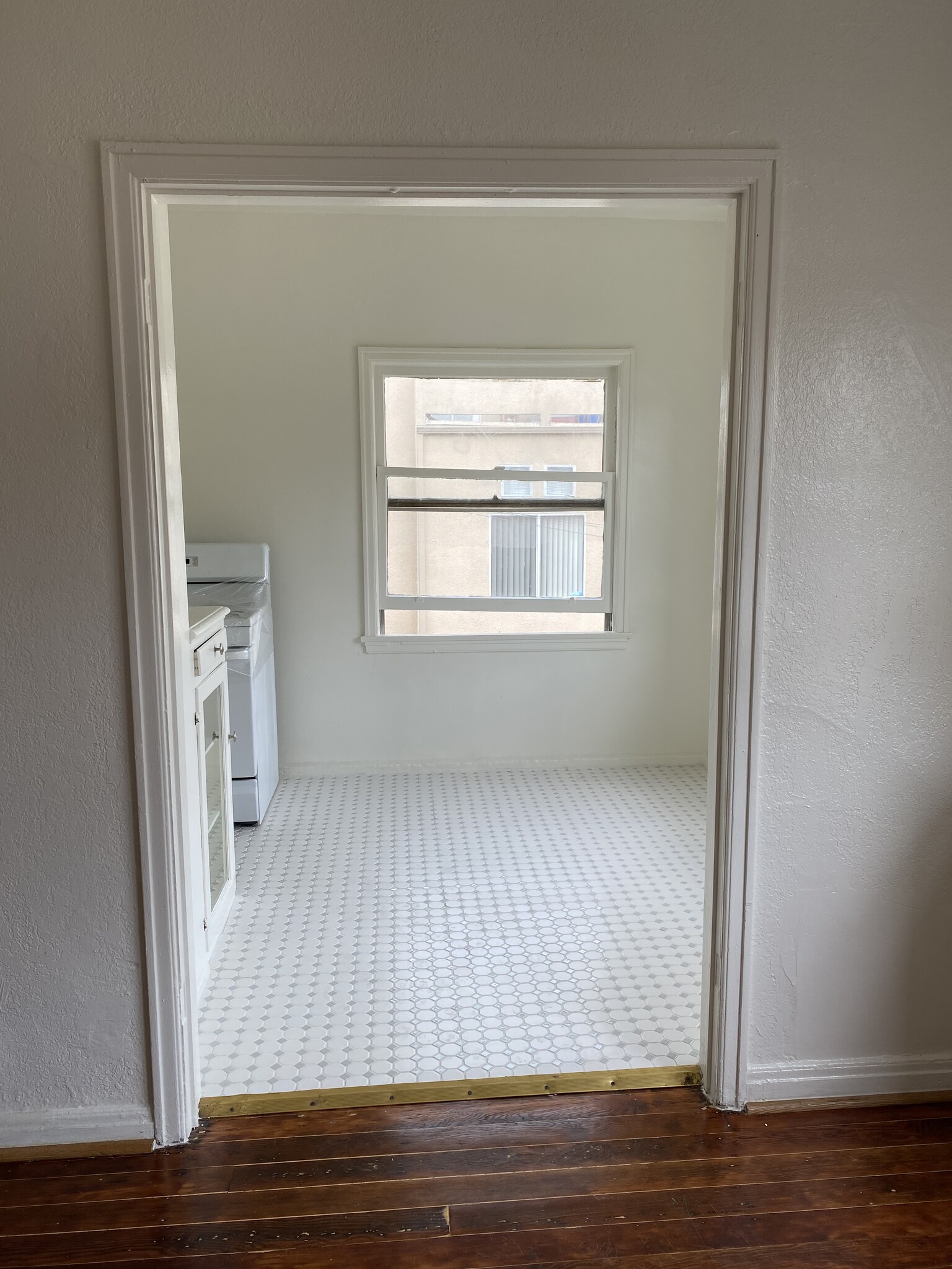 Newer tile - 545 S Hobart Blvd