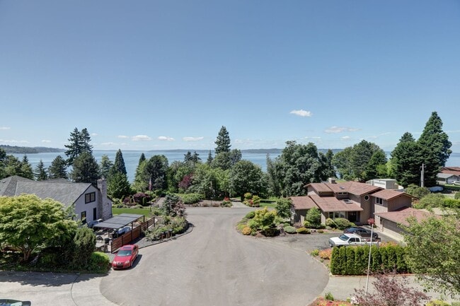 Building Photo - 4+ Bedroom with Great Entertaining Wrap Around Decks with VIEW of PUGET SOUND!!