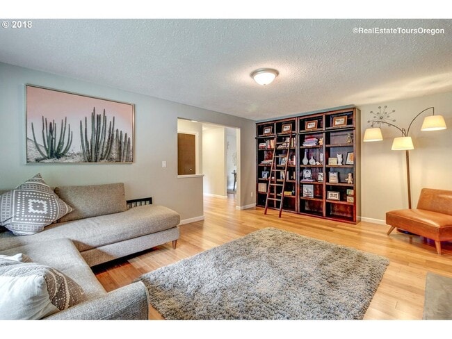 Building Photo - Spacious 4-Bedroom Home with Multiple Livi...
