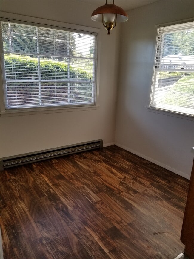 Building Photo - Occupied, do not disturb tenants. 2br duplex with carport and stackable washer/dryer included!