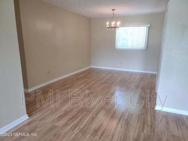 Building Photo - 7819 Lisa Dr E