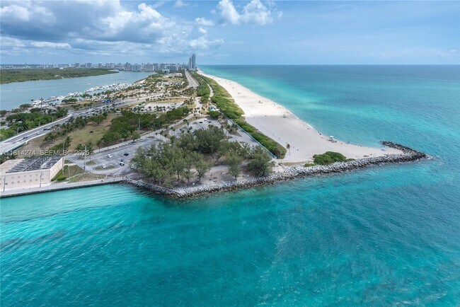 Building Photo - 10295 Collins Ave