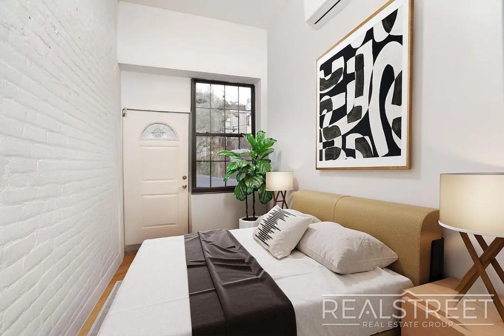 Building Photo - Prime Williamsburg 3-Bedroom with Private Backyard + Laundry in Building