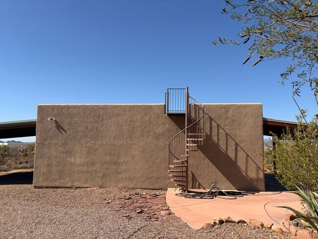 Building Photo - Desert Home on 3.3 Acres with Rooftop Views & Unique Rammed Earth Design