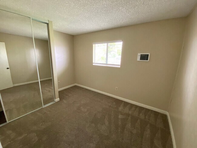 Building Photo - LOCATION & PRIVACY! Spacious 3 br Condo wi...