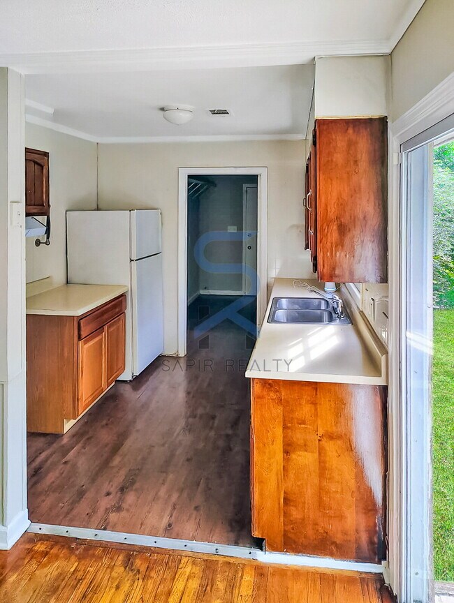 Building Photo - Move in before December 15th and choose your reward: a $250 Amazon Gift Card or a 55" Smart TV!