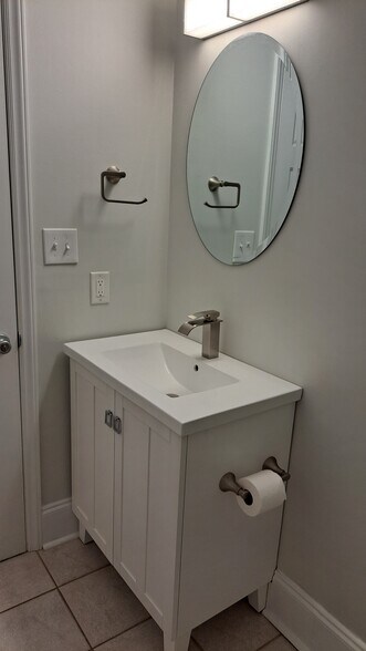 Partial view of Bathroom - 101 E Broad St