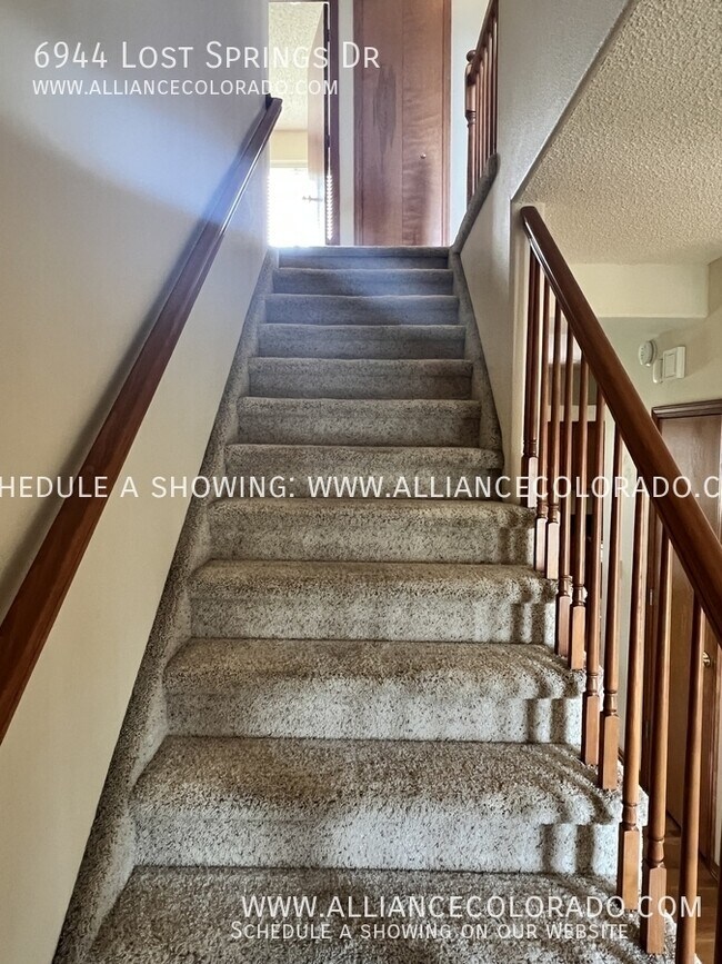 Building Photo - 6944 Lost Springs Dr