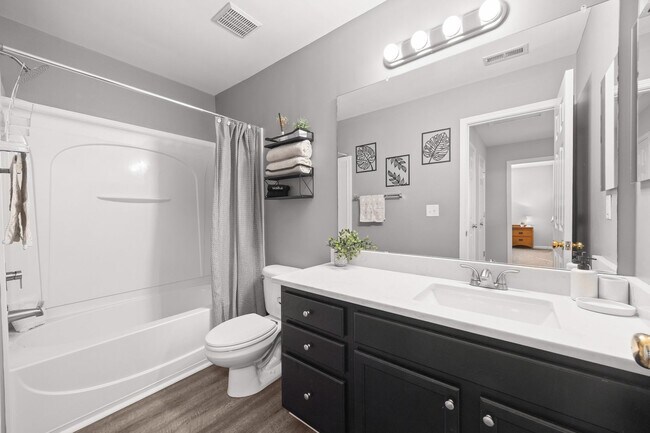 Building Photo - This immaculate 3-bed, 2.5 bath townhome in the Olde Stone Crossing community with the primary be...