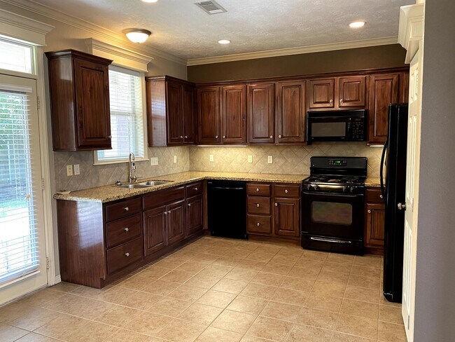 Building Photo - 8422 Alison Ave