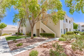 Building Photo - Charming 2-Bed/2-Bath Condo with Dual Mast...
