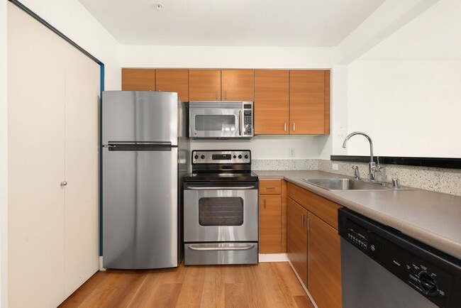 Building Photo - Modern Cap Hill 1 Bedroom with Garage Parking & Laundry Room