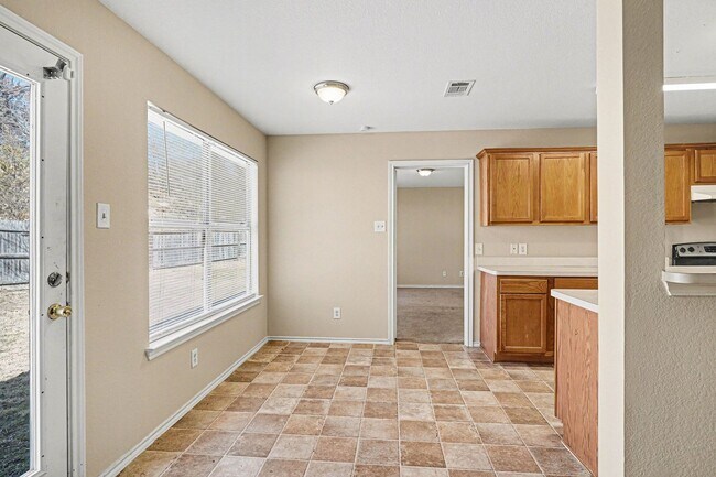 Building Photo - Updated 3-2-2 in Dallas! New Carpet and Paint! Big Yard!