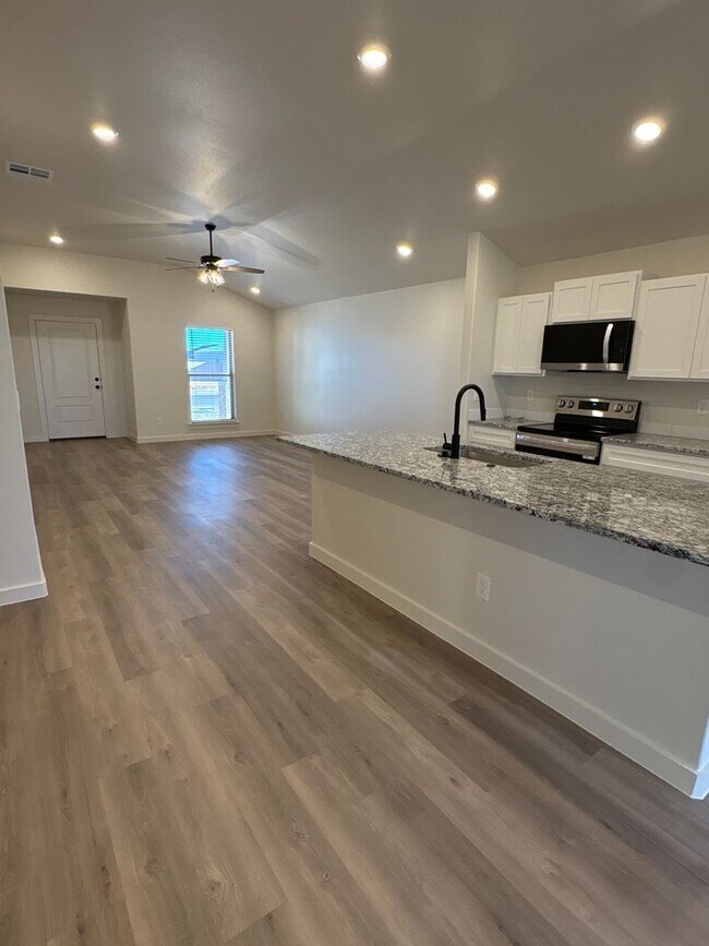 Building Photo - Pay NO RENT until March!! New, with great sunset views; 2168 Langfords' the home for you!