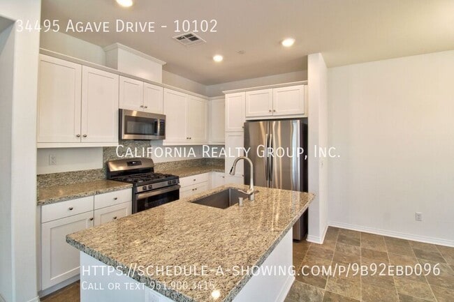 Building Photo - 34495 Agave Dr