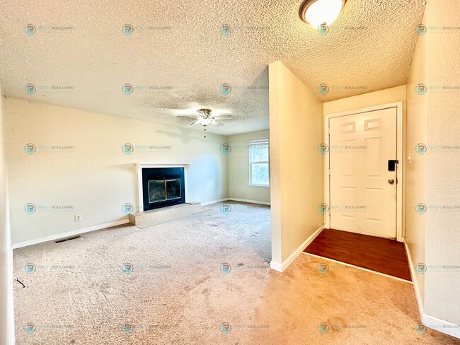 Building Photo - $1000.00 Off Move-In Costs! Charming 3-Bed...