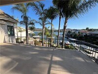Building Photo - Stunning Lakefront Retreat in Gated Canyon...
