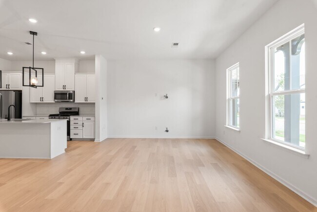 Building Photo - Welcome home to this stunning brand-new townhome in one of Indian Trail's newest and most desirab...
