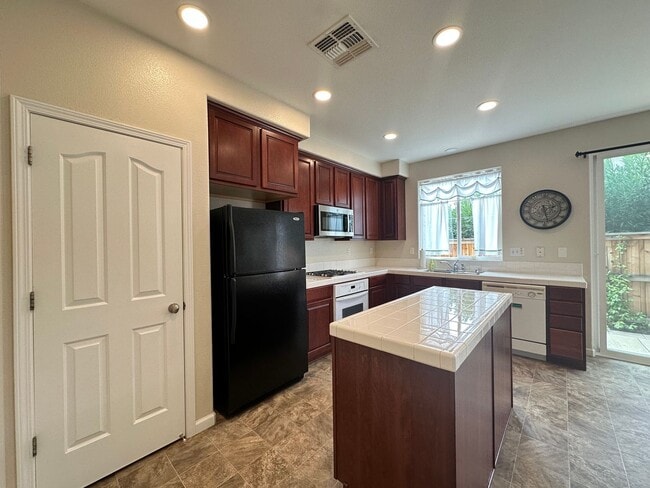 Building Photo - Three Bedroom Corner Lot Home