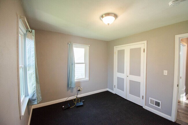 Building Photo - Fenced Yard, 2-Car Garage + Internet Included