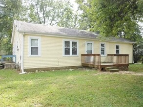 Building Photo - Three Bedroom Home with Main Floor Laundry on a Large Acre + Lot!!