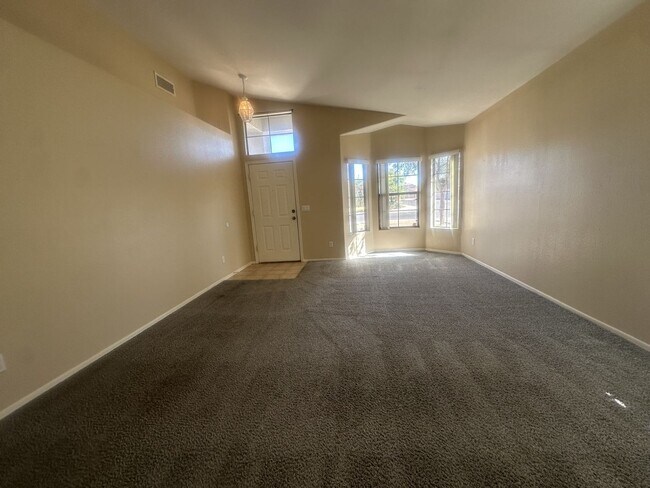 Building Photo - Rare single-level home offers 5 bedrooms and a versatile floor plan designed for comfortable living