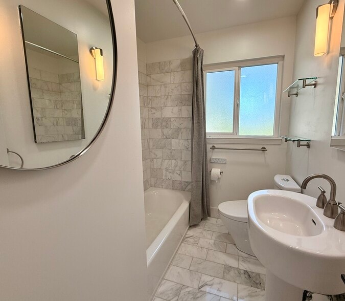 Marble tiled, updated bath - 496 Sherwood Way