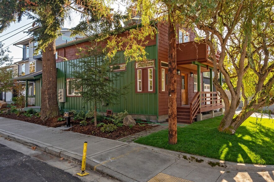 Front of house with large porch. - 8752 Dayton Ave N