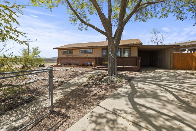 Building Photo - Updated 2 Bed + Bonus Workshop | Huge Backyard | Two Storage Sheds | Carport | Pet Friendly