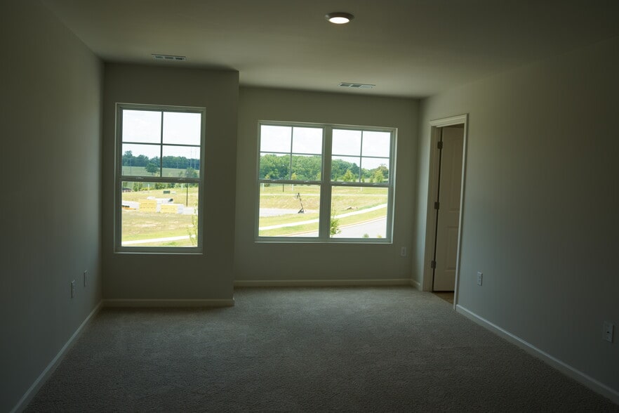 Master bath with open windows - 265 Deerberry Dr