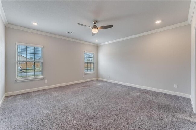 Building Photo - Minutes from I-49! 4BR/2.5BA Home