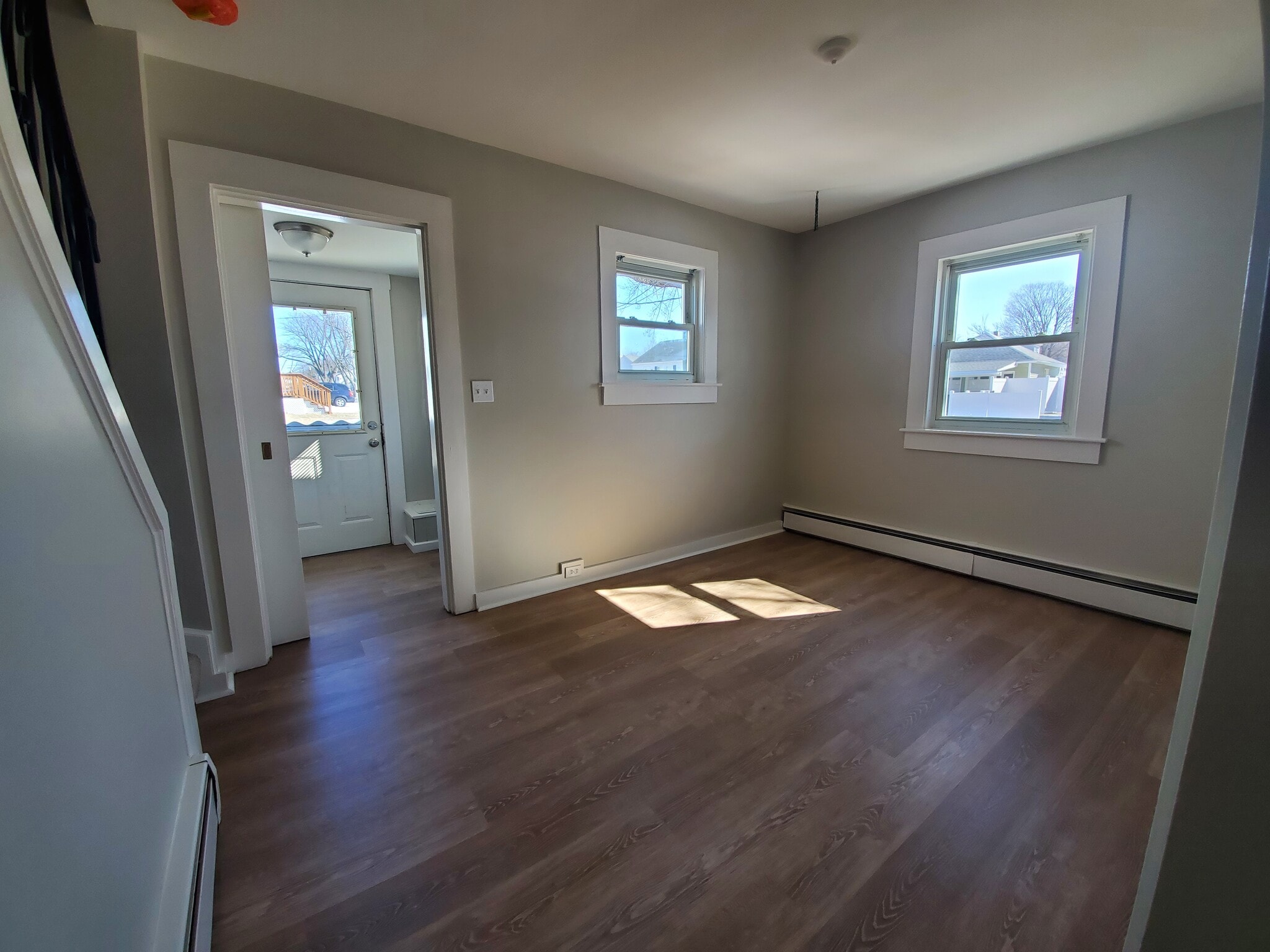 Office space looking into mudroom with slider door - 12 Villa St