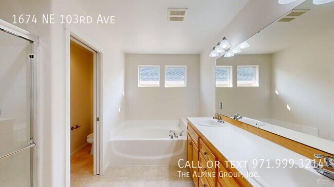 Building Photo - 1674 NE 103rd Ave