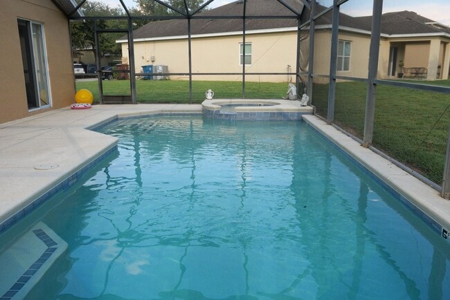 Building Photo - 4 Bedroom Pool Home Available Now!