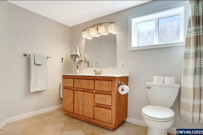 Building Photo - Available Now! 5 bedroom house with large yard and RV parking!