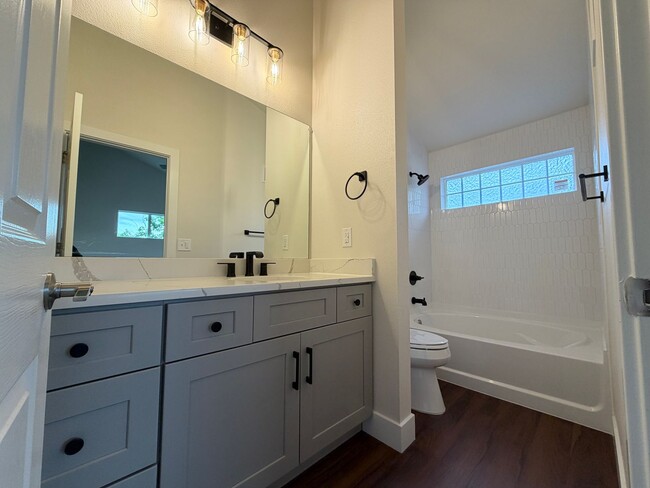 Building Photo - Remodeled Top-Level Condo in Pool Community Near Shopping & Dining