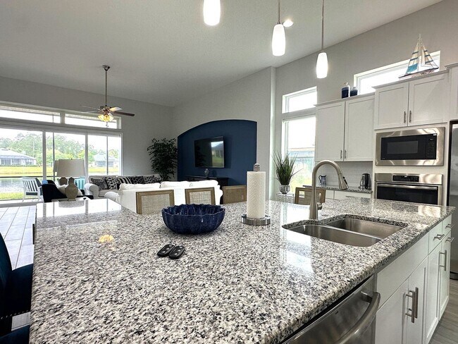 Building Photo - Stunning 4/4, Available Immediately, Fully...