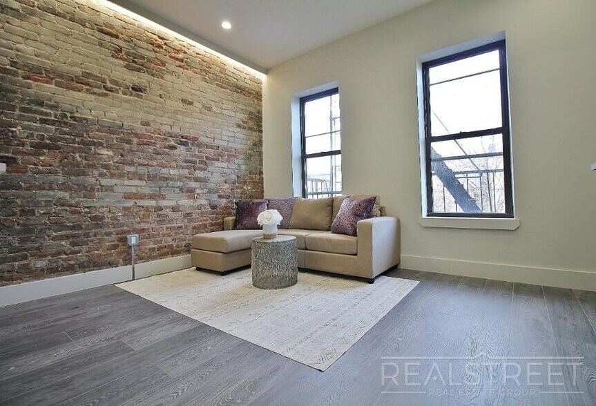 Building Photo - Spacious 2BR w/ Laundry, Pets OK, Backyard & Lounge | Steps to Brower Park & 3/4/C Trains
