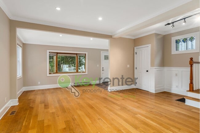 Building Photo - Spacious 3BR Home with Finished Attic, Fenced Yard & Easy NYC Commute – No Broker Fee