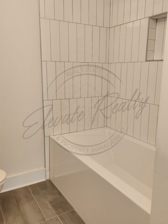 Building Photo - ON SPECIAL! THIS PROPERTY HAS 1/2 OFF THE ...