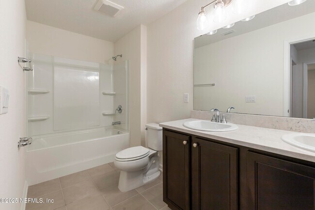 Building Photo - 11006 Stapleton Dr