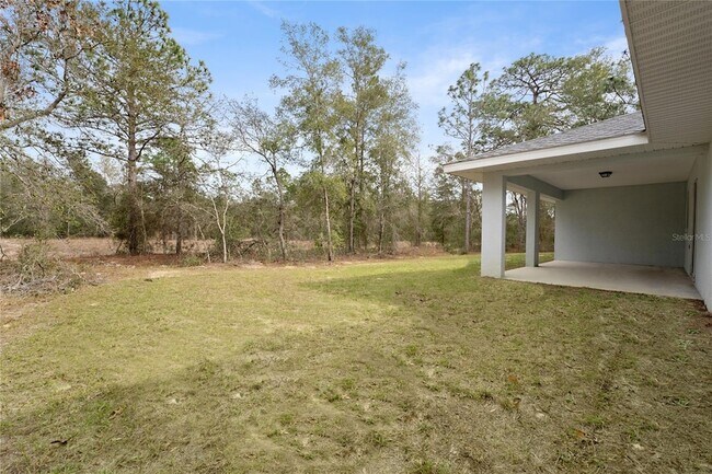 Building Photo - 9461 N Sandree Dr