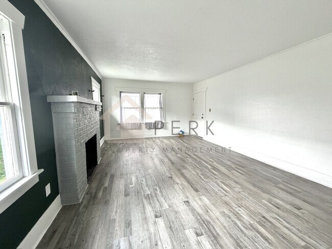 Building Photo - Charming Updated South Tacoma Home with Spacious Bonus Loft and Fenced Yard