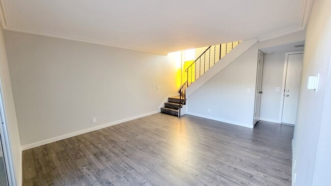 Building Photo - 2 bedroom, 1.5 bath townhome with 2 parkin...