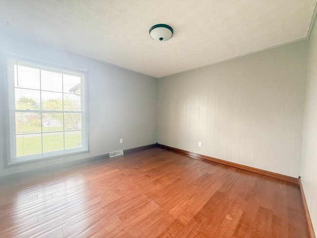 Building Photo - Spacious 3-Bedroom Home with Huge Yard, Covered Porches & Storage Building