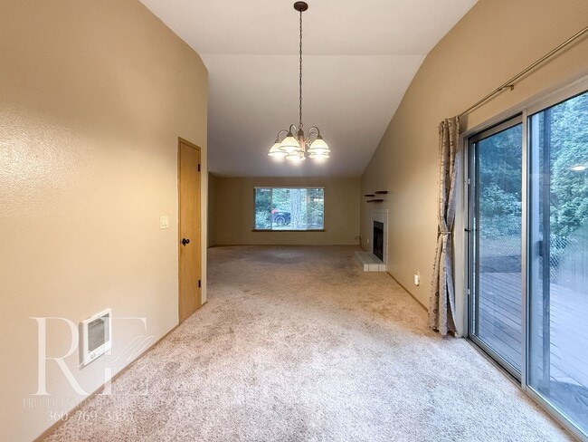 Building Photo - Vaulted Ceilings, Skylights & a True Primary Suite in This Gig Harbor Duplex