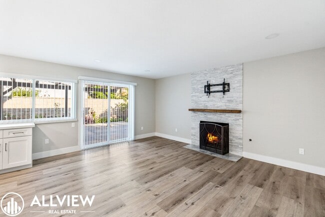 Building Photo - Welcome to this stunning 5-bedroom, 4-bath...
