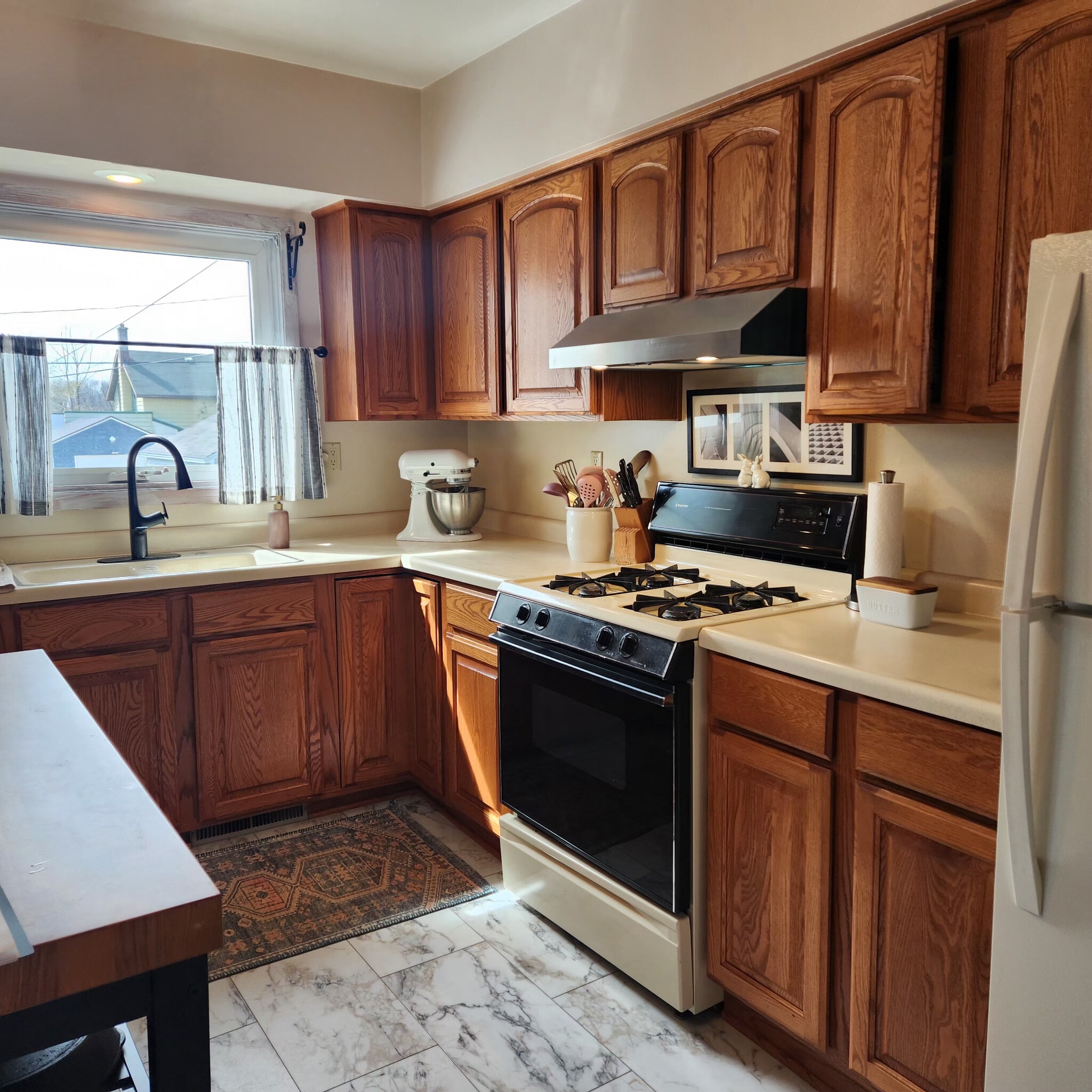Kitchen: Stove, and fridge - 1710 S 14th St